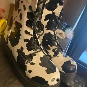 Cow print women’s boots super cute says size 11 fits like a